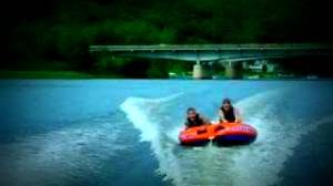 Lake Zoar Water Activities Picture of people tubing on a Monroe lake